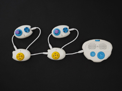 A photo of a Code Jumper program containing two Loop pods, two Play pods, a Plus plug, and a Minus plug.